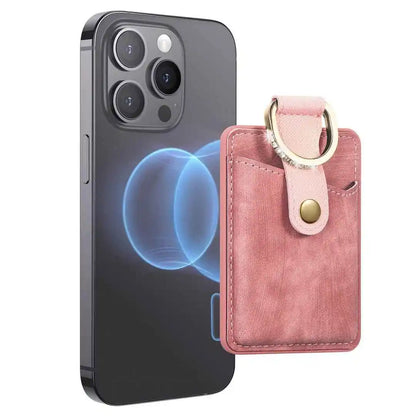 Pink phone wallet with key ring and card holder next to a smartphone on a white background