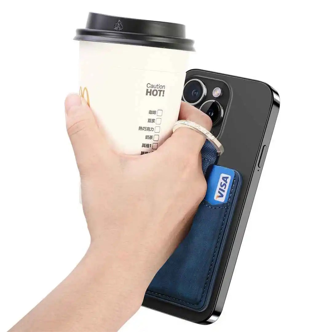 Hand holding a phone with a blue card holder, a coffee cup, and a Visa card on a white background