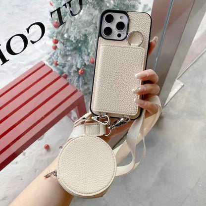 Beige wallet phone case with strap held by a hand against a blurred indoor background