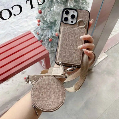 taupe wallet Phone case with detachable strap held by a hand, blurred background