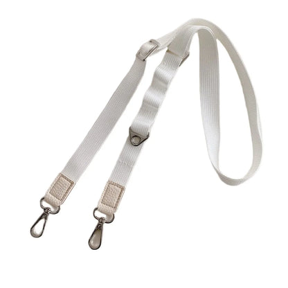 White crossbody phone strap with metal clips on a white background