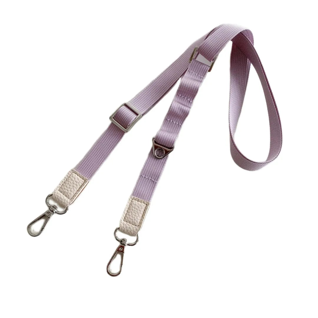 Purple crossbody phone strap with gold hardware on a white background