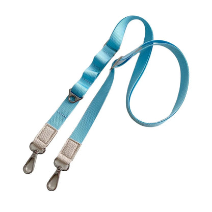Blue crossbody phone strap with metal clips on a white background