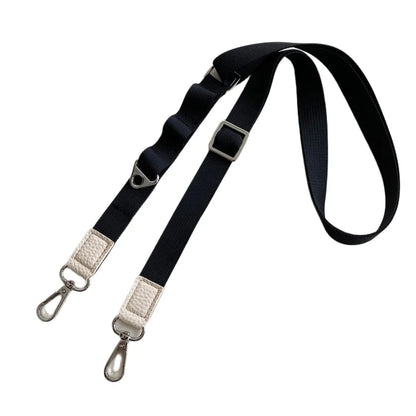 Black lanyard with metal clip and keychain on a white background