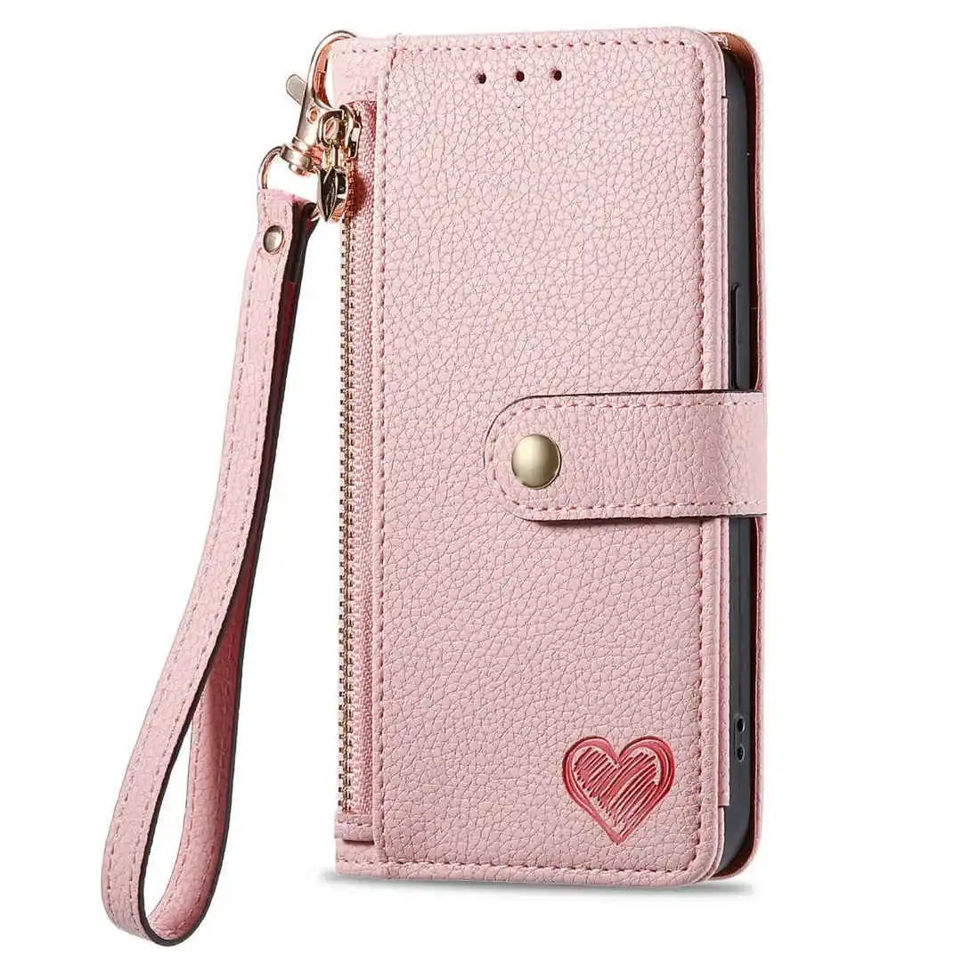 Pink phone case with a heart design and strap on a white background